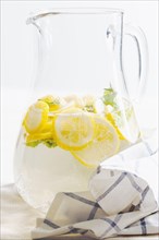 Pitcher of herbal lemon water