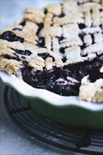 Close up of sliced blueberry pie