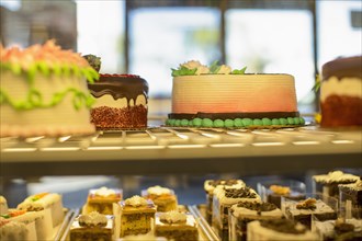 Close up of cakes in pastry case