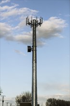 Cell tower overlooking street