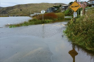Traffic sign on flooded road