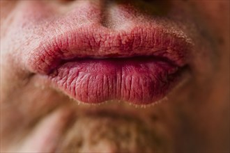 Close up of lips of pouting Caucasian man