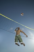 African American man playing volleyball