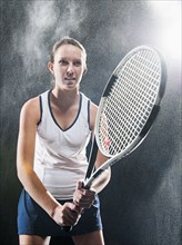 Caucasian tennis player in rain