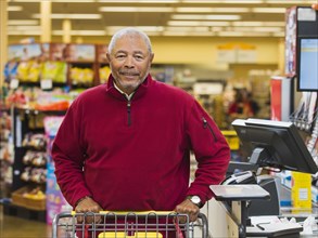 African American customer at grocery store checkout