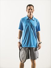 Caucasian tennis player smiling