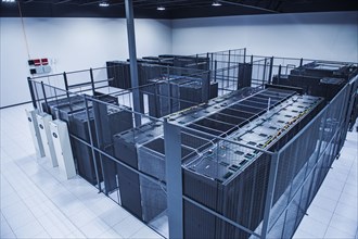 High angle view of technology in server room cage