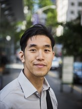 Portrait of smiling Chinese businessman