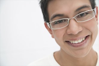 Smiling Hispanic man in eyeglasses