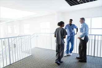 Doctor and nurses talking