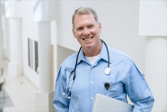 Portrait of smiling Caucasian doctor