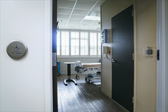 Doorway to an empty hospital room