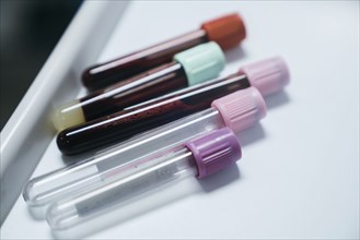 Test tubes with caps on table