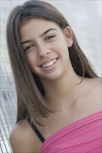 Hispanic teenage girl smiling