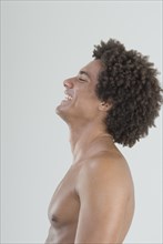 Mixed Race man with bare chest