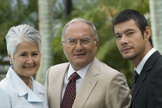 Portrait of Senior Hispanic parents and adult son