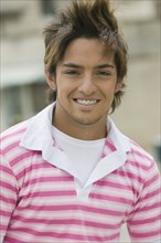 Young Hispanic man with braces