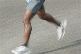 Blurred runner's legs running