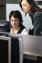 Hispanic businesswoman working together in office