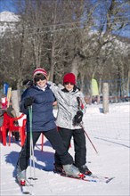 Hispanic boys skiing