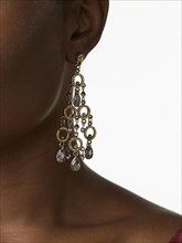 African woman wearing glamorous earrings