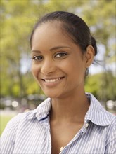 Close up of smiling mixed race woman