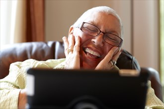 Caucasian woman using digital tablet