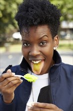 Black woman eating ice cream