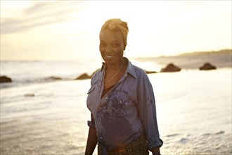 Black woman enjoying the beach