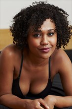 Mixed race woman wearing bra