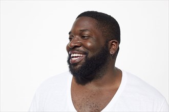 Close up of smiling Black man with beard