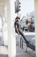 African American man standing on city street