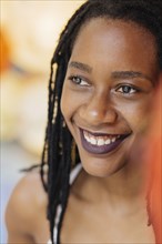 Portrait of smiling Mixed Race woman