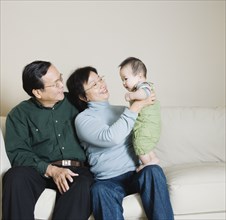 Asian family with baby