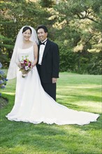 Portrait of Asian newlyweds