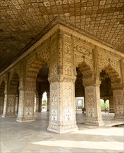 Ornate pillars and arches in Indian building
