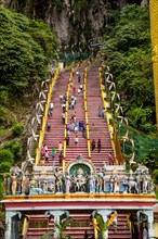 People climbing steps to Hindu shrine at Batu Caves