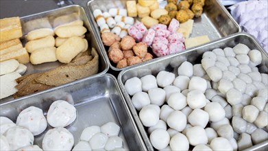 Soy cakes and fish for sale in market