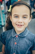 Mixed race girl smiling outdoors