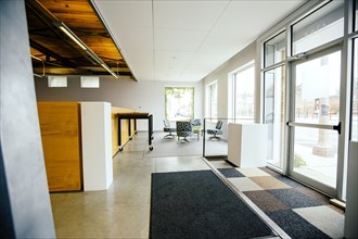 Furniture and door in empty office