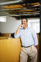 Black businessman smiling in office