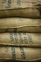 Close up of stack of burlap sacks