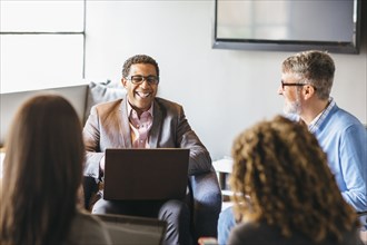 Business people talking in office meeting