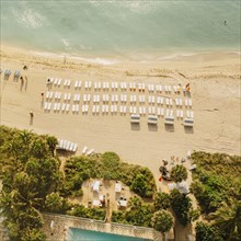 Aerial view of hotel pool and tropical beach