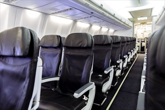 Empty chairs in airplane