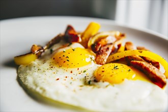 Plate of fried eggs and vegetables