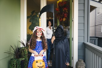 Children trick-or-treating on Halloween
