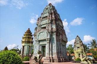 Statues and ornate pillars at Angkor Wat