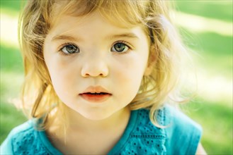 Portrait of serious Caucasian preschool girl