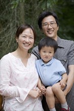 Smiling Asian family